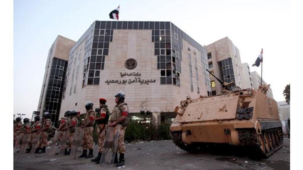 Army soldiers stand guard in front of the Security Directorate after the withdrawal of police forces in Port Said, 170 km (106 miles) northeast of Cairo. Photograph: Mohamed Abd El Ghany/Retuers