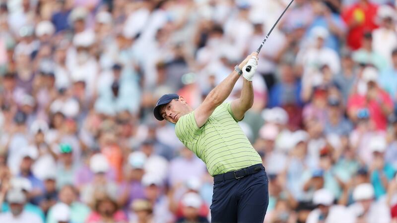 Rory McIlroy plays his opening tee shot at Southern Hills. Photograph: Richard Heathcote/Getty