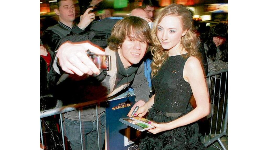 Actor Saoirse Ronan cannot escape the cameras at the Savoy Cinema, Dublin last night.
