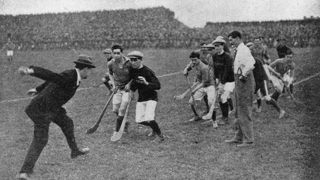 Michael Collins throwing in the sliotar to start a hurling game at Croke Park in 1921. Photograph: Hogan/Hulton Archive/Getty Images