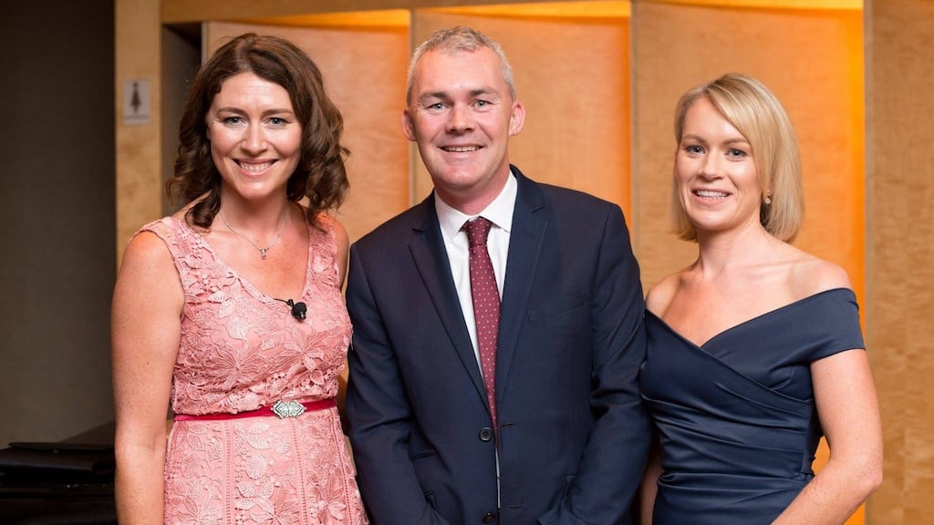 Catherine and Oliver Morrissey with Emma Hannigan, host of the Irish Australian Business Awards