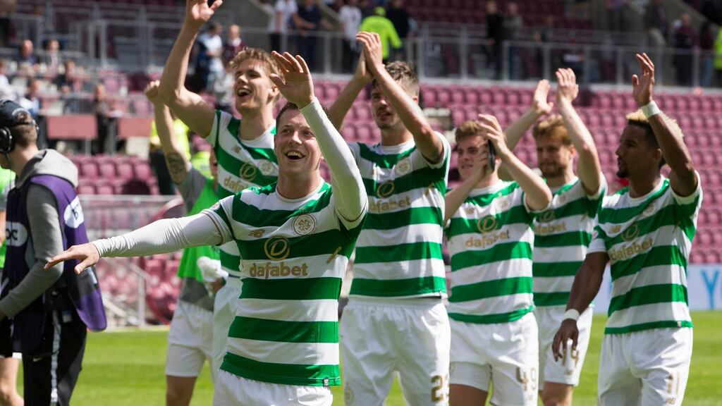 Celtic’s Callum McGregor celebrates after his team’s win at Tynecastle Stadium, Edinburgh. Photograph: PA