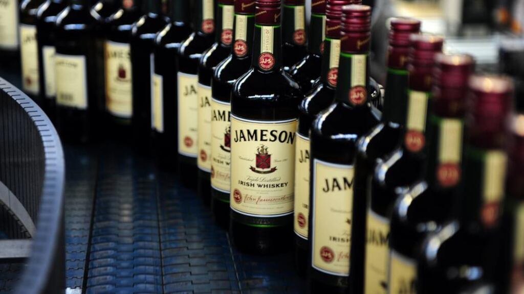 Bottles of Jameson whiskey, produced by Irish Distillers, are seen as they pass along the production line at the Pernod-Ricard bottling plant in Dublin. Photograph: Aidan Crawley/Bloomberg