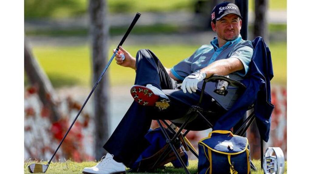 Graeme McDowell relaxes during yesterday's practice round for the WGC-Cadillac at Doral. Photograph: Getty Images