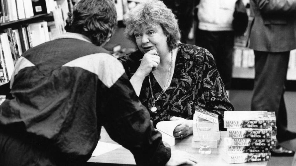 Time for the reader: Maeve Binchy signs books in 1991. Photograph: Frank Miller