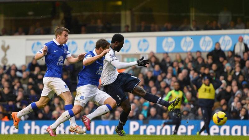 Tottenham Hotspur’s Emmanuel Adebayor scores his goal against Everton at White Hart Lane . Photograph: Toby Melville/Reuters