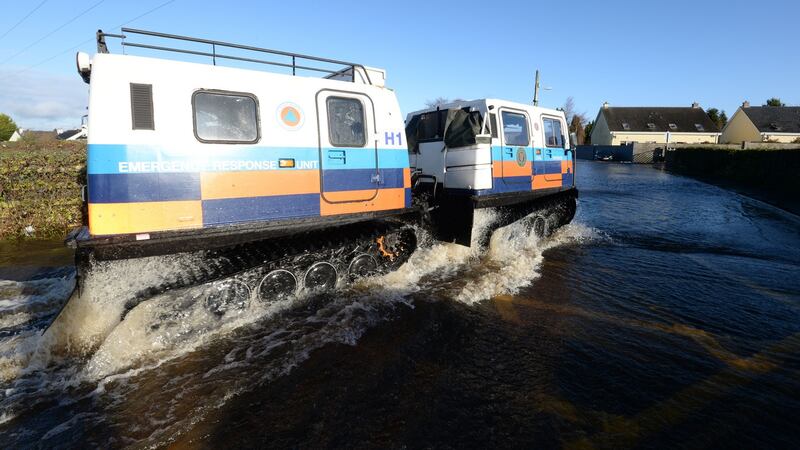 Flooding from the River Owenass on the Manor Road in Mountmellick, Co Laois Photograph: Alan Betson / The Irish Times