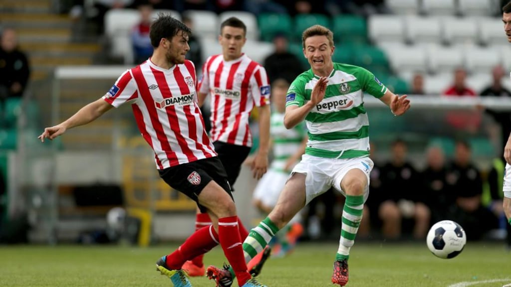 Ronan Finn of Shamrock Rovers and Derry City’s Phillip Lowry during the FAI Cup semi-final at Tallaght Stadium. Photograph: Inpho