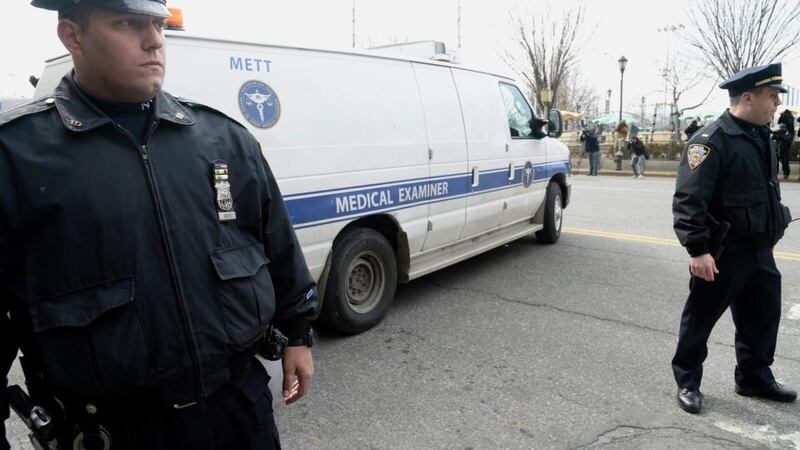 A New York City medical examiners van is seen leaving 200 11th Avenue where the body of fashion designer L’Wren Scott was found inside her apartmenttoday. Photograph: Andrew Gombert/EPA.