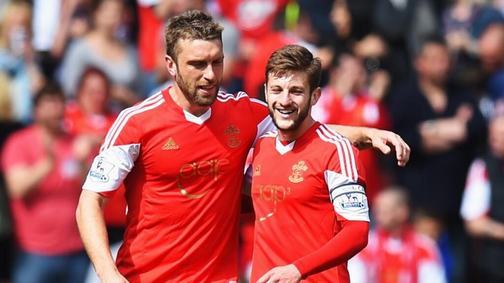 Rickie Lambert (left) of Southampton and team mate Adam Lallana (right) are both Liverpool targets. Photograph: Mike Hewitt/Getty Images