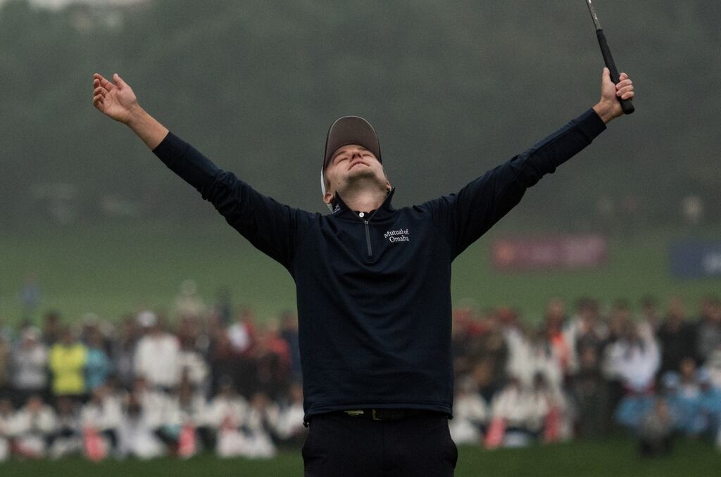 Russell Knox of Scotland celebrates after winning the WGC-HSBC Champions golf tournament in Shanghai. Photograph: Getty Images