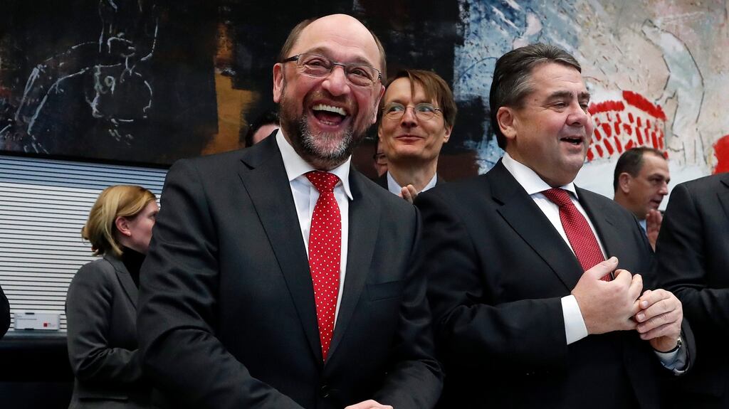 The new leader of the Social Democratic Party (SPD), Martin Schulz smiles next to his predecessor, Sigmar Gabriel, at a party meeting in the Bundestag on Wednesday. Photograph: Felipe Trueba/EPA