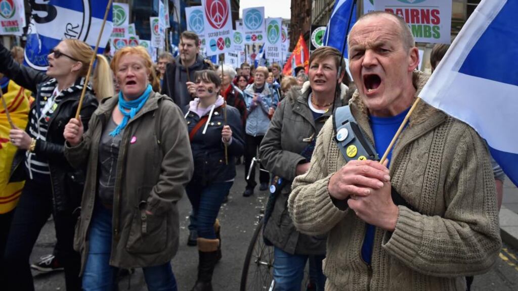 Anti-nuclear demonstrators march in Glasgow. Patrick Harvie of the Scottish Greens addressed the crowd. Photograph: Jeff J Mitchell/Getty Images