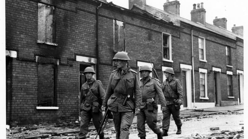 The aftermath of Catholic families burned out of their homes by a loyalist mob in 1969. Photograph: Gerry Collins