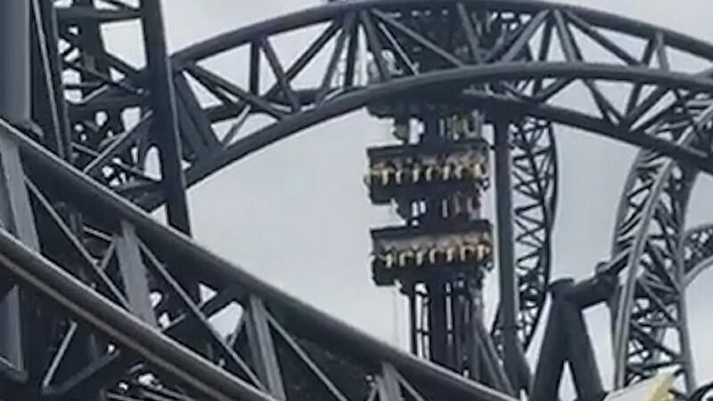 Screen grabbed image taken with permission from video issued by @Bifold_fitting of the Smiler rollercoaster at Alton Towers, Staffordshire, which has become stuck. Photograph: @Bifold_fitting/PA
