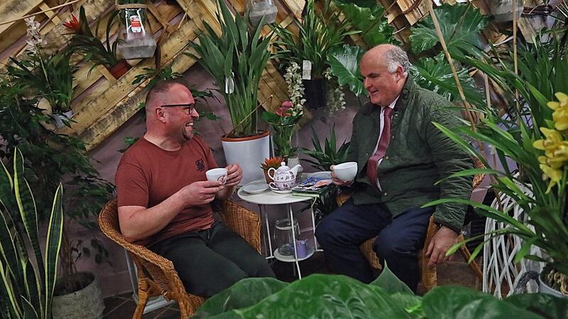 Fianna Fáil candidate Joe Flaherty chats to Stan Hromada at his florist’s shop in Longford on Thursday morning. Photograph: Lorraine Teevan