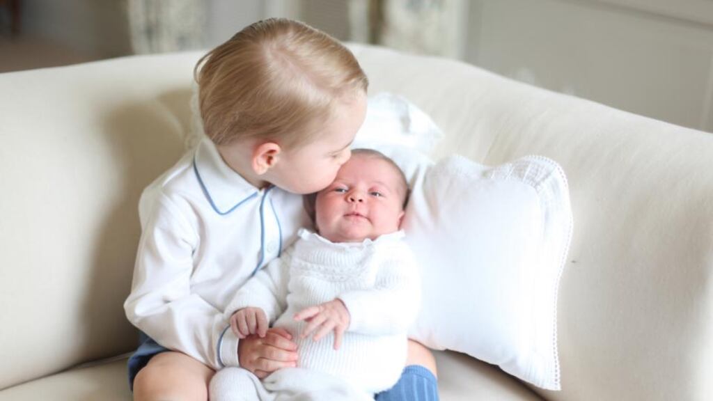 Britain’s Princess Charlotte is kissed by her brother Prince George in a photograph taken by their mother the Duchess of Cambridge in mid-May at Anmer Hall in Norfolk. Photograph: Duchess of Cambridge via PA Wire.
