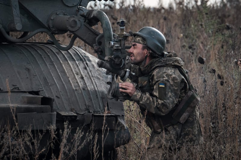 A Ukrainian soldier prepares to fire a BM-21 Grad multiple rocket launcher towards Russian positions in the Kharkiv region on Tuesday. Photograph: Yasuyoshi Chiba/AFP via Getty Images