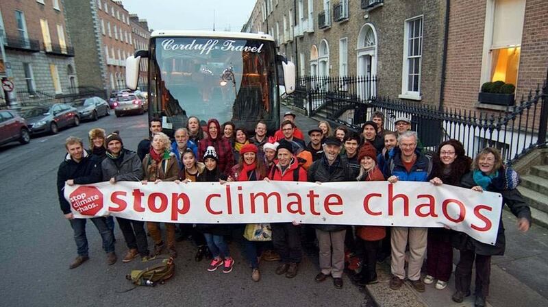 Campaigners on the “Stop Climate Chaos” bus in Dublin on Wednesday before sailing to France. Photograph: Eoin Campbell