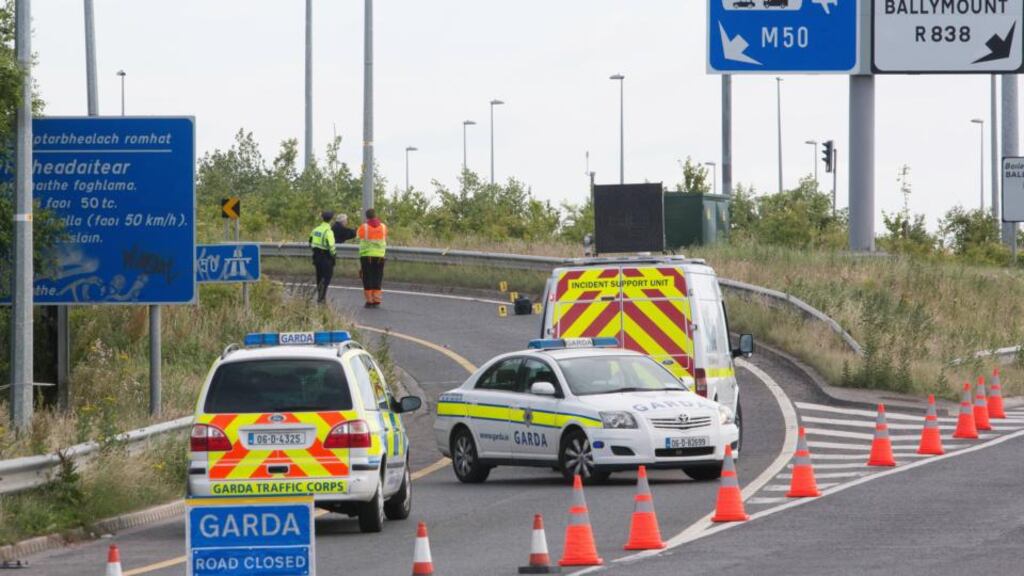 Gardaí at the scene of a road collision early today in which a motorcyclist died following a single-vehicle fatal road crash at the Ballymount slip road onto the M50 Northbound, Dublin. Photograph: Gareth Chaney Collins