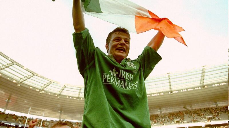 Brian O’Driscoll celebrates Ireland’s win in Paris in 2000. Photograph: Billy Stickland/Inpho