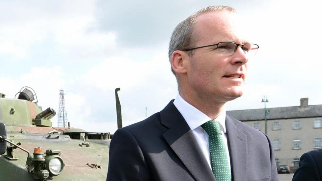 Minister for Defence Simon Coveney has said Irish soldiers whose travel to the Golan Heights has been delayed by two weeks are ‘anxious to get on and do their job’. File Photograph of Minister in Athlone: Eric Luke/The Irish Times