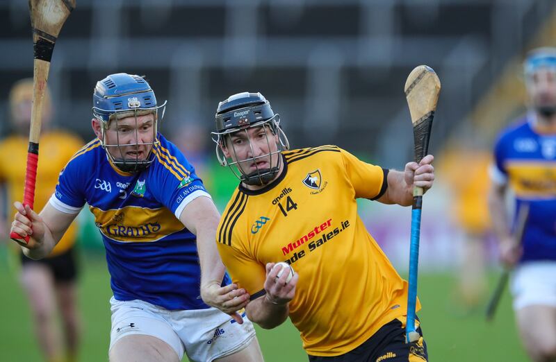 Ian Galvin of Clonara takes on David Sweeney of Kiladangan. Photograph: Natasha Barton/Inpho