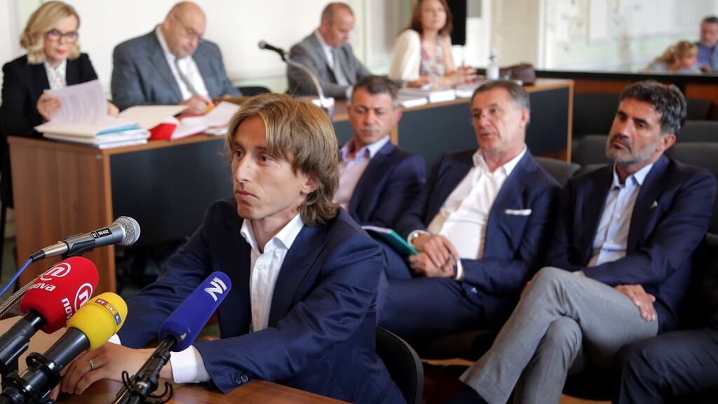 Luka Modric appears in a court in Osijek to testify in the corruption trial against former Dinamo Zagreb executive Zdravko Mamic. Photograph: STR/AFP/Getty Images