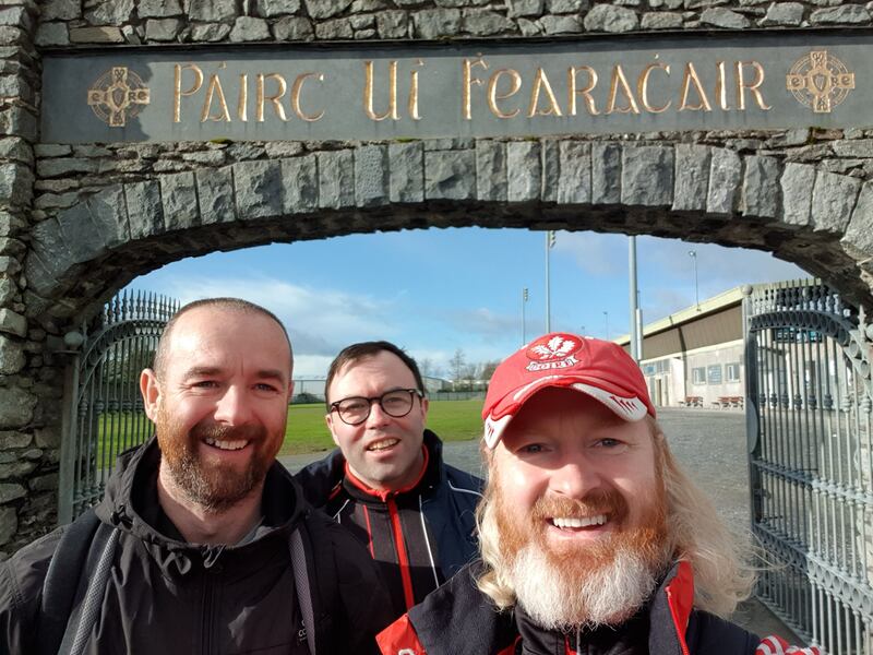 Steven Doherty, Paul McIntyre, Simon Doherty at the entrance to Fraher Field before the 2019 Division 4 game