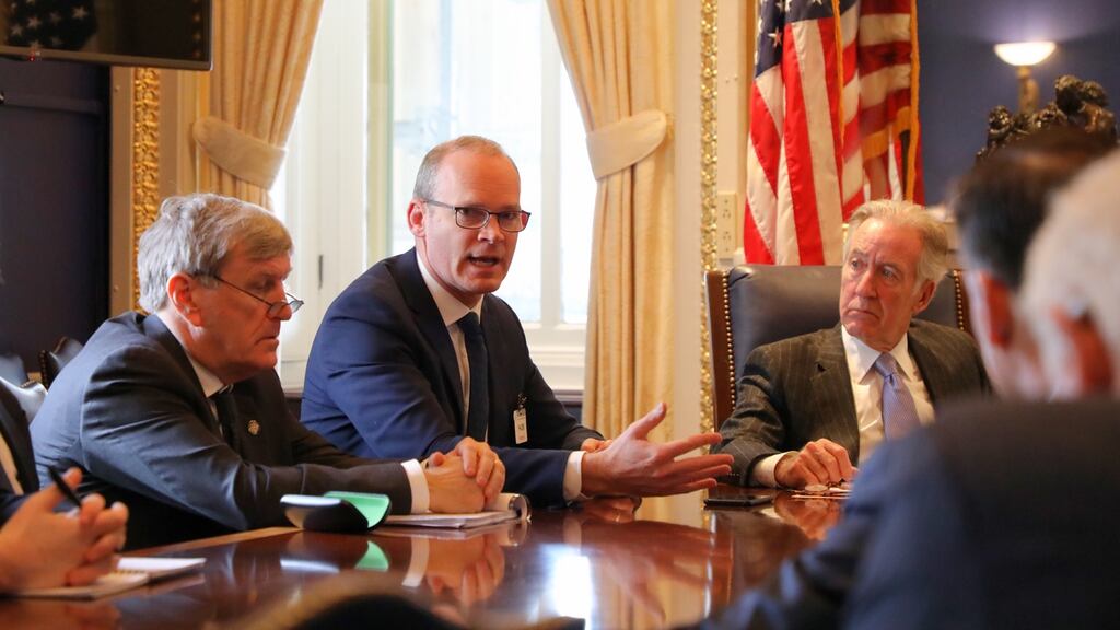 Tánaiste Simon Coveney (centre) with members of the Friends of Ireland caucus inside the Ways and Means committee room in the US Capitol building in Washington on Thursday. Left, Irish ambassador to the US Dan Mulhall and, right, committee chairman Richard Neal. Photograph: Marty Katz