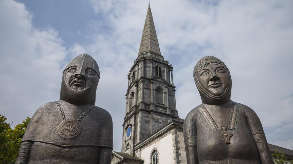 Statues of Strongbow and Aoife flank Christ Church Cathedral in Waterford, designed by John Roberts.
