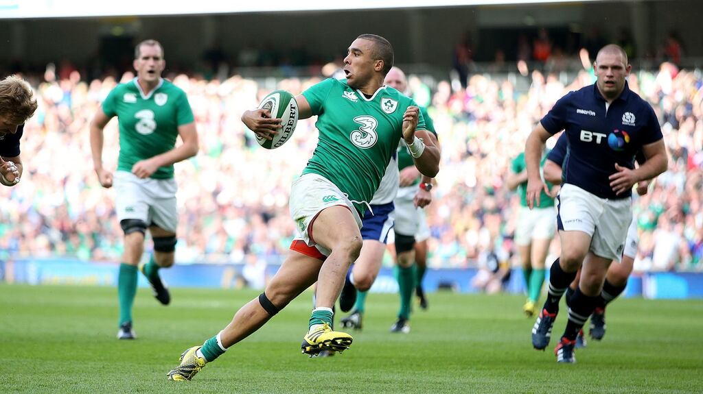 Simon Zebo scores a try against Scotland at the Aviva Stadium. The Munster winger has been in outstanding form this season for Munster. Photograph: Dan Sheridan/Inpho