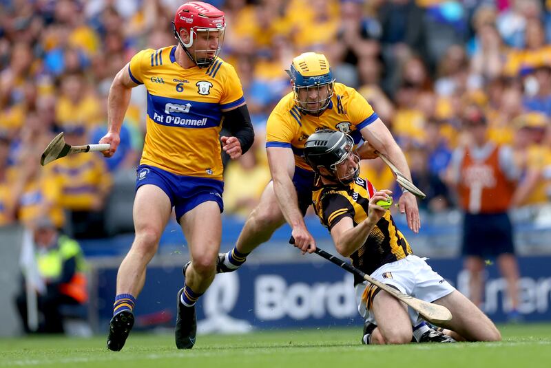 Clare’s John Conlon and Seadna Morey tackle Tom Phelan of Kilkenny - their tactic of playing an extra defender in the first half did not work. Photograph: James Crombie/Inpho