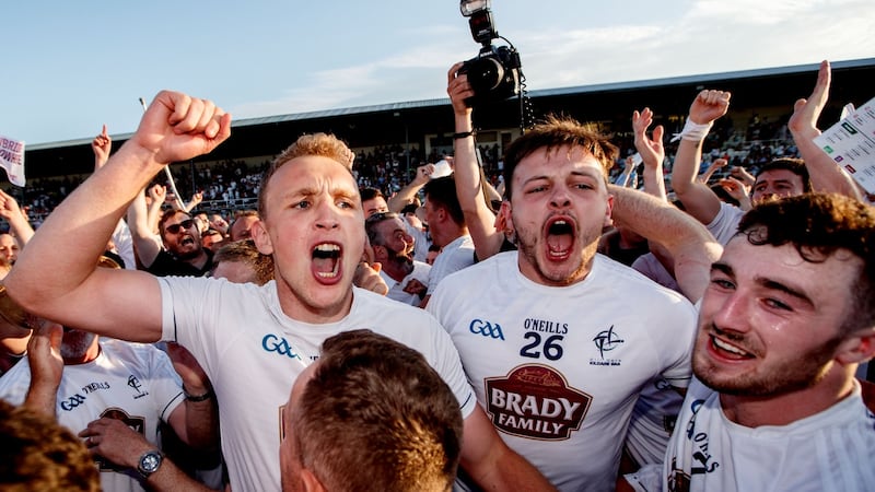 Kildare’s Tommy Moolick, Pascall Connell and Kevin Flynn celebrating their win in Newbridge over Mayo. Photograph: James Crombie/Inpho