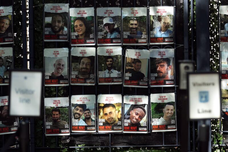 Posters of Israeli hostages being held in Gaza displayed outside the Israeli embassy in Washington, DC. Photograph: Alex Wong/Getty Images