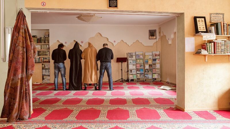 Prayer at a mosque in Riga, Latvia. Photograph: Reinis Hofmanis/The New York Times