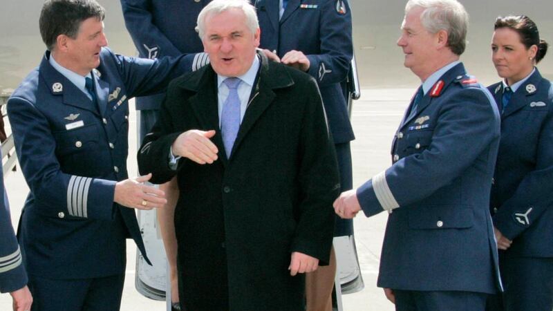 Lisa Smith (on the extreme right of the picture) is seen attending to taoiseach Bertie Ahern in this image from April 2008. File photograph: Colin  Keegan/Collins
