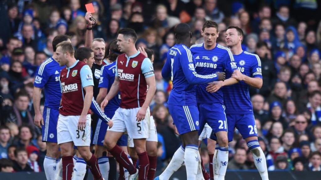 Chelsea’s Nemanja Matic is shown a red card by referee Martin Atkinson after the controversial incident at Stafmord Bridge. Photo: Tony O’Brien/Reuters
