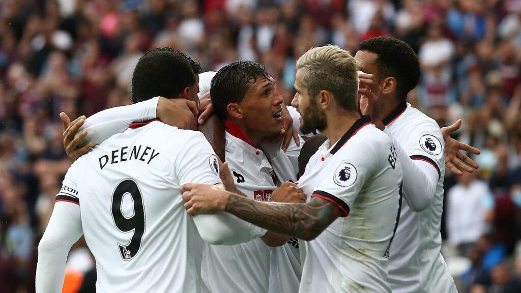 Watford midfielder José Holebas (centre) celebrates scoring his team’s fourth goal during the Premier League match against West Ham at The London Stadium. Photograph: Justin Tallis/AFP/Getty Images