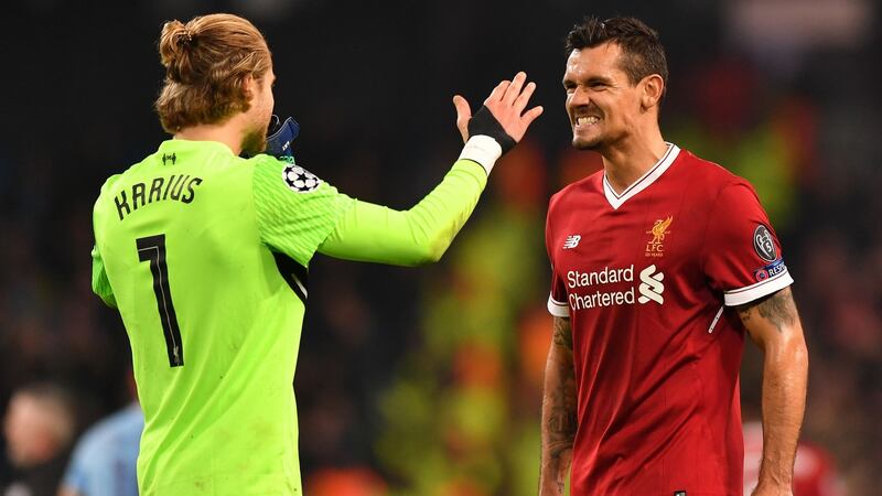 Liverpool’s German goalkeeper Loris Karius and Croatian defender Dejan Lovren. Photograph: Getty Images