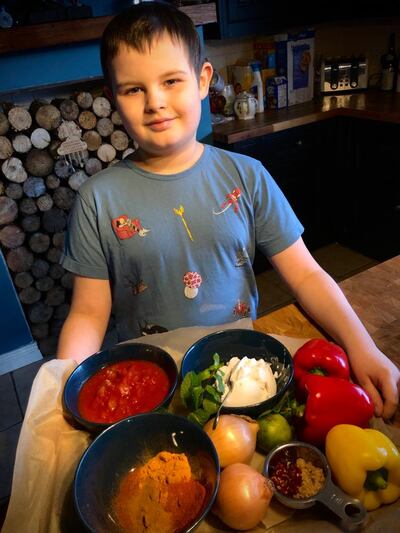 Patrick McLaughlin getting ready to cook with his mum Mary.