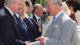 Prince Charles and Camilla welcomed at Catholic church in Belfast