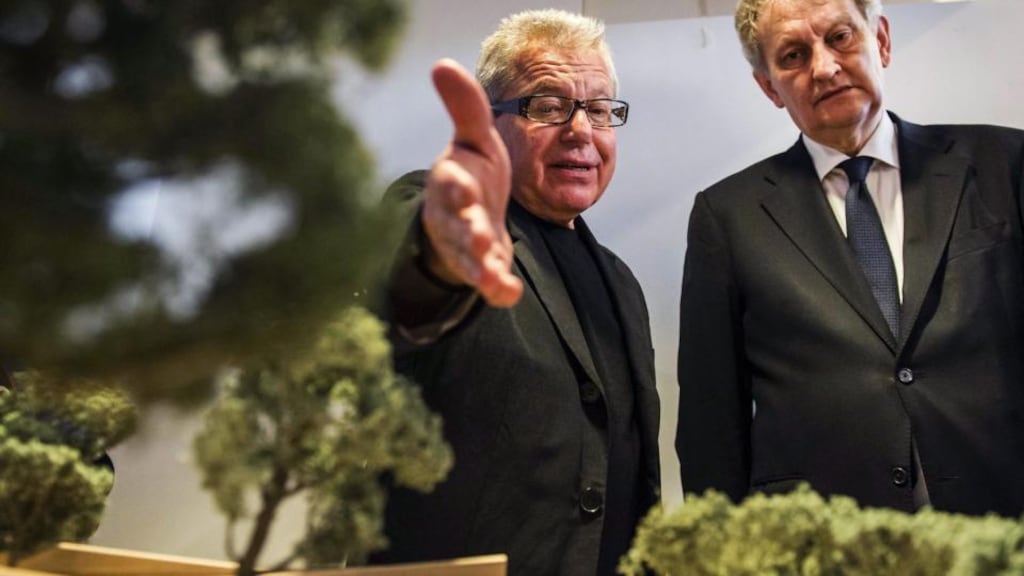 Architect Daniel Libeskind (left) presents a model of the Holocaust Names Monument to Amsterdam mayor Eberhard van der Laan at the town hall of Amsterdam. The memorial that will bear the names of all the Dutch Holocaust victims. Photograph: Remko de Waal/EPA