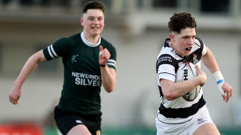 Belvedere College’s Matthew Grogan on his way to scoring a try  in the  Bank of Ireland Leinster Schools Senior Cup quarter-final against Newbridge College at Donnybrook Stadium. Photograph: Oisin Keniry/Inpho