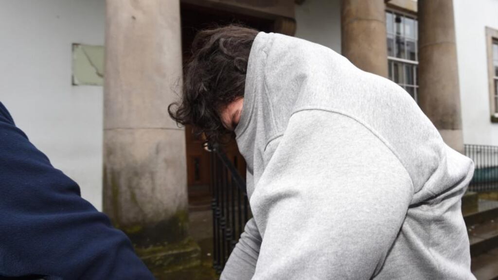 Daniel Allen (27) leaves Enniskillen Magistrates’ Court where he was charged with murdering four people following a  fire at house on Molly Road in Derrylin last weke. Photograph: PA Wire.