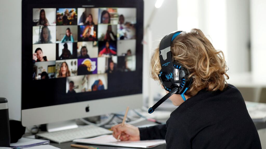 A student in Spain and his classmates take online classes at home, via Zoom, earlier this year. Photograph: Albert Gea/Reuters