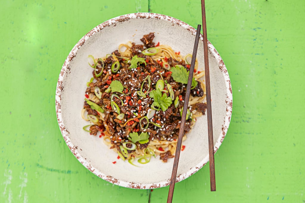 Mongolian stir-fried beef with sesame and noodles. Photograph: Harry Weir
