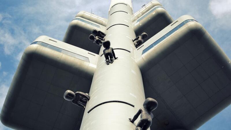 Artist David Cerny’s giant babies crawl up the side of the Zizkov Television Tower in Prague – location of the One Room Hotel