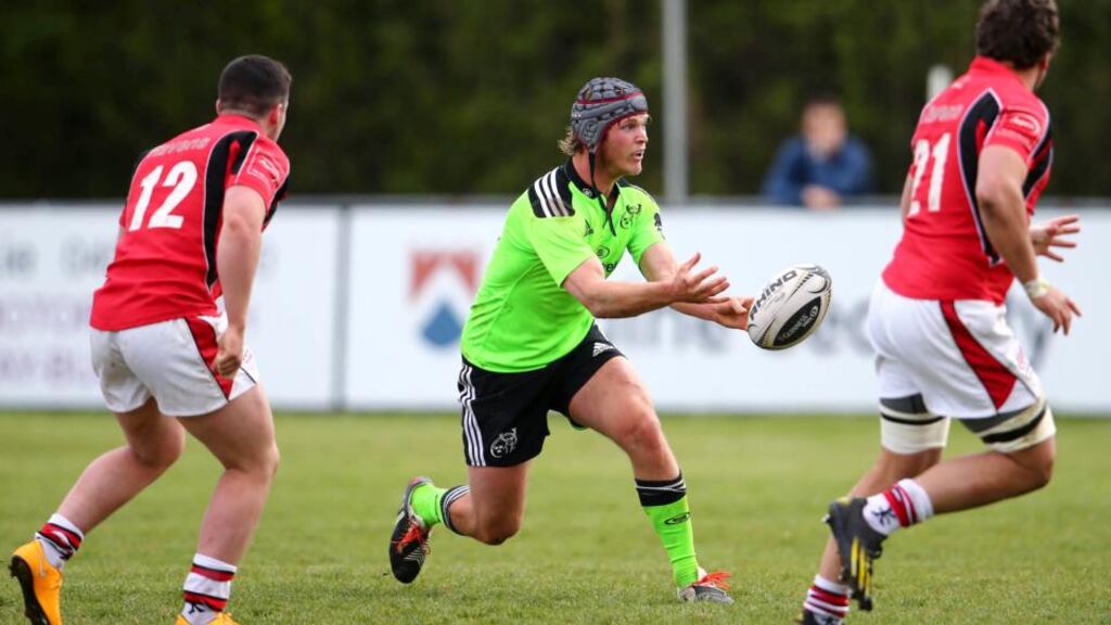 Munster’s Tyler Bleyendaal lays off a pass during Munster A’s game against Ulster Ravens at Nass RFC. Photograph: Cathal Noonan/Inpho.
