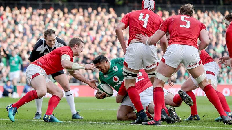 Ireland’s Bundee Aki scores their second try. Photograph: Dan Sheridan/Inpho